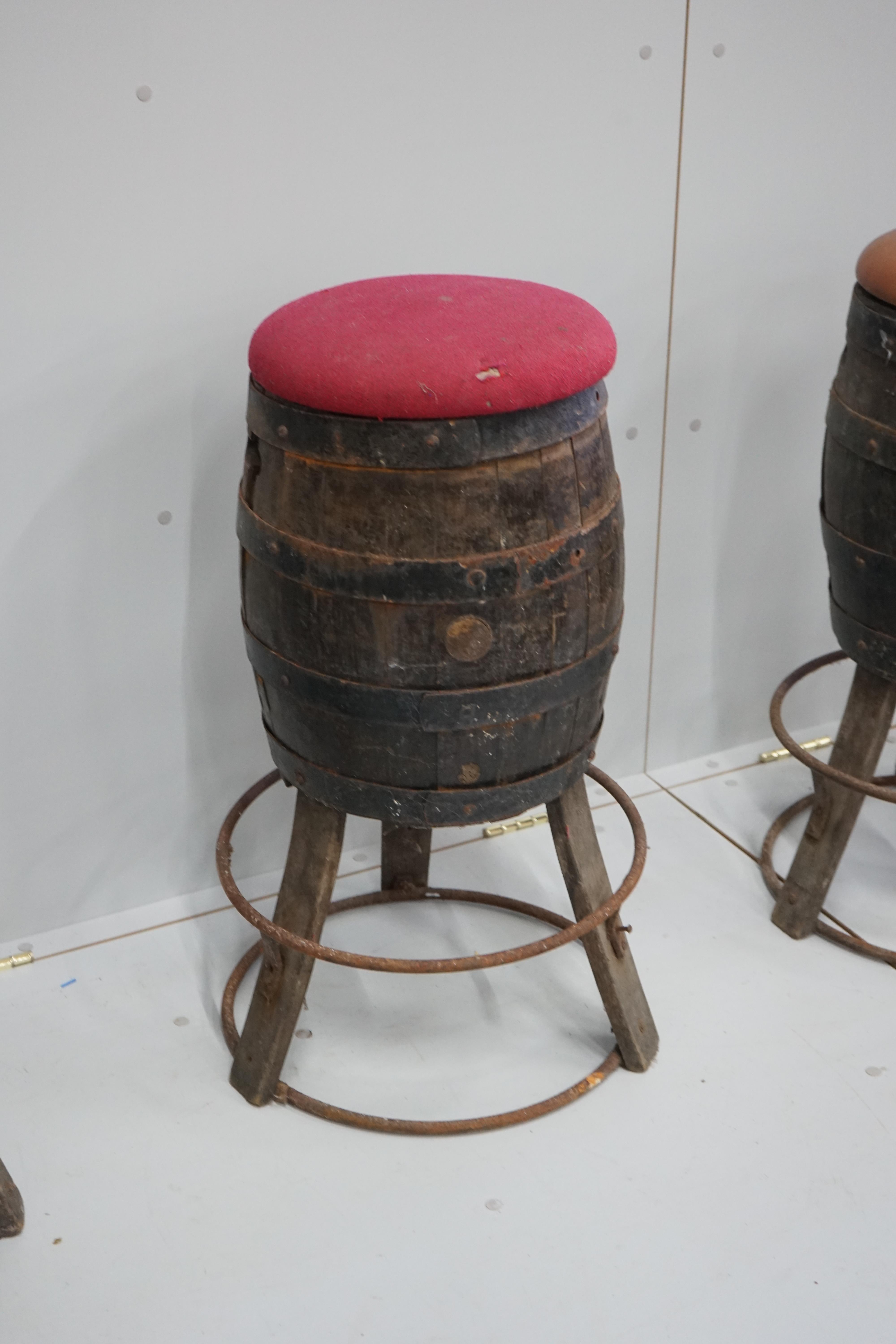 A set of four barrel bar stools, height 73cm